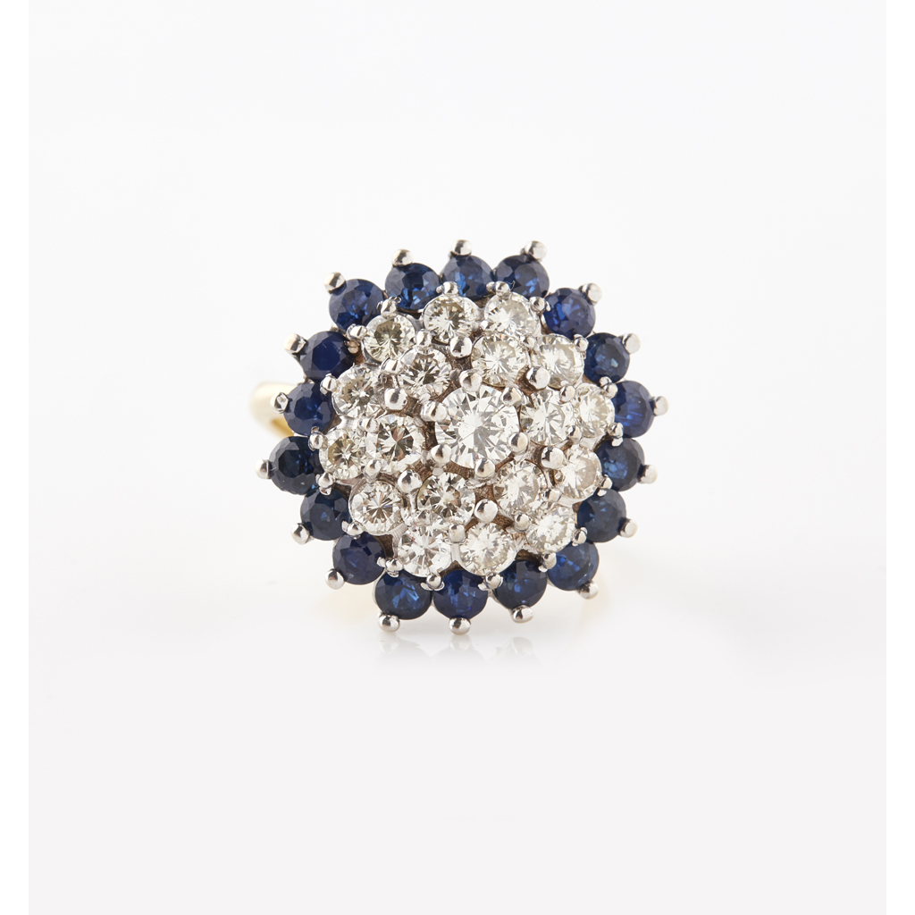 A sapphire and diamond set cluster ring