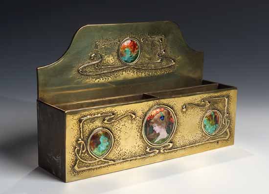 A Scottish School brass and enamel inlaid stationary rack