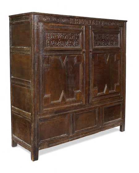 A late 17th century oak press cupboard,