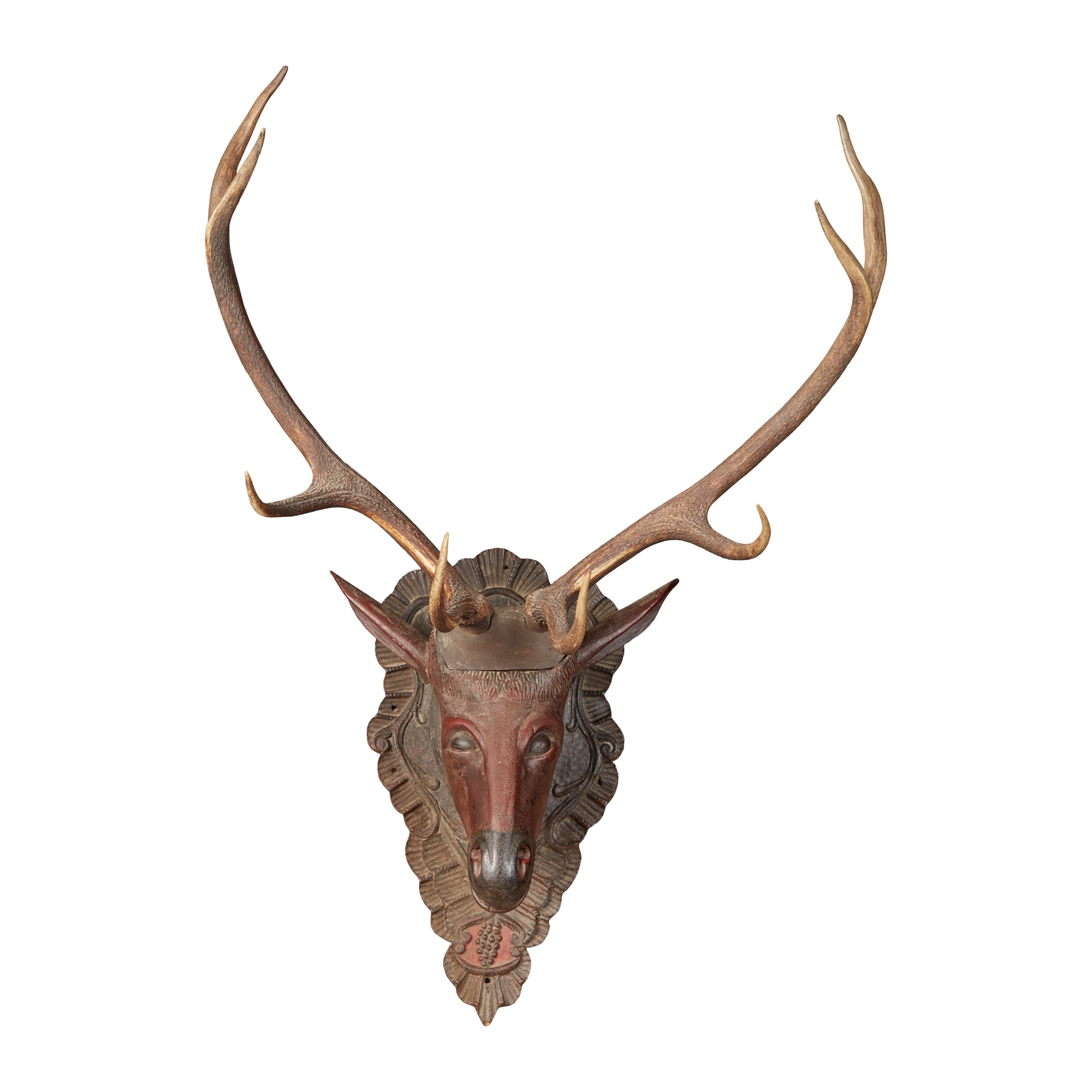 GERMAN BLACK FOREST CARVED AND POLYCHROMED STAG'S HEAD AND ANTLERS