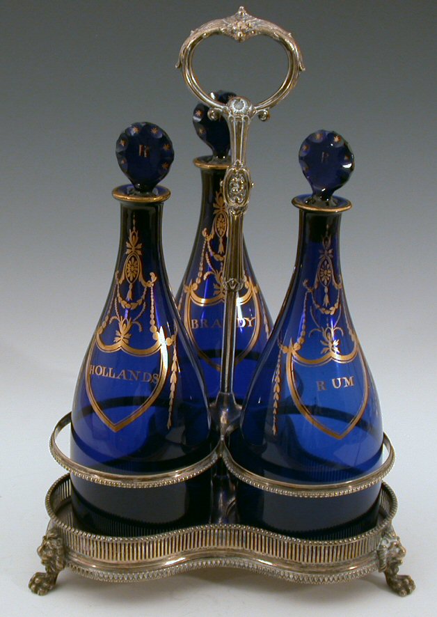 A set of three Georgian blue glass decanters
