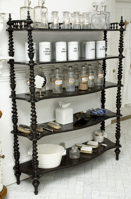 A Victorian ebonised whatnot