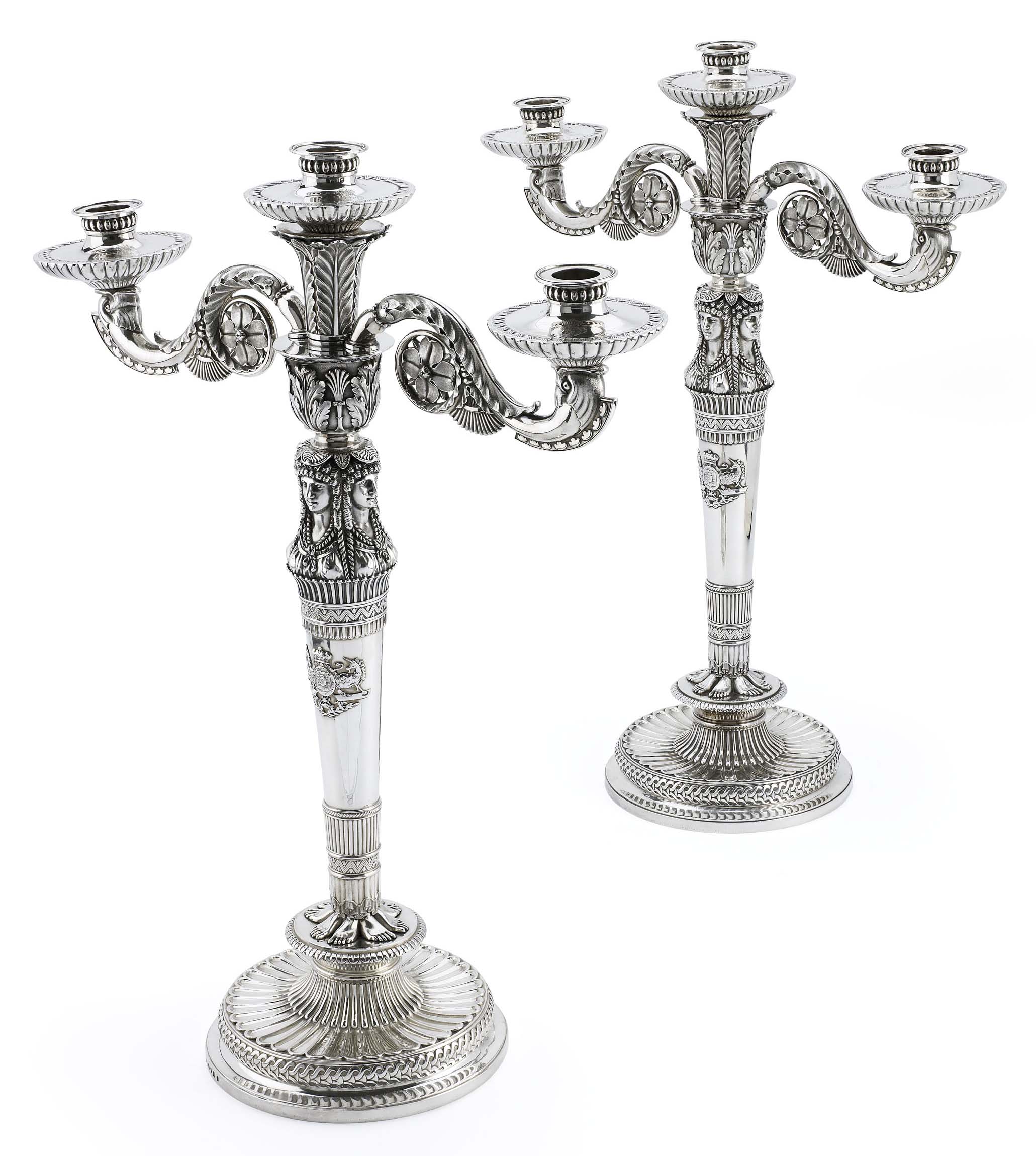 An exceptional pair of George III Royal three light candelabra