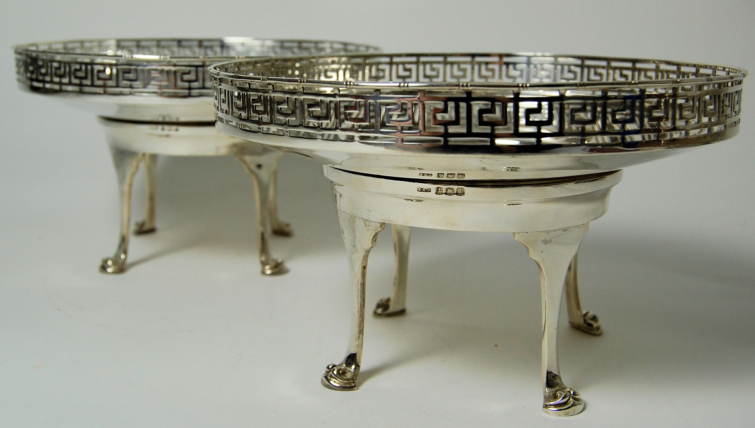 A pair of bon bon dishes and stands