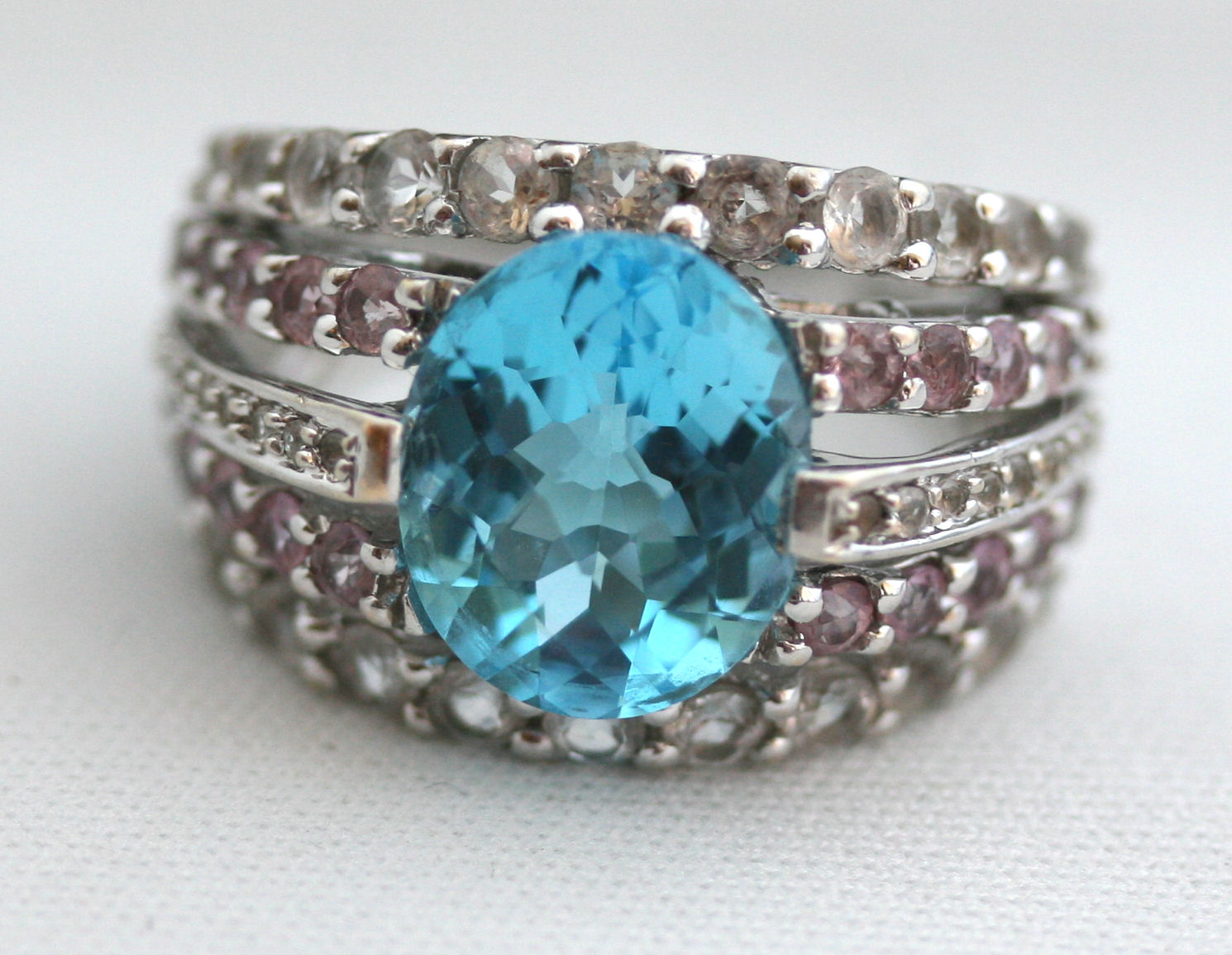 A Topaz and sapphire bombe dress ring