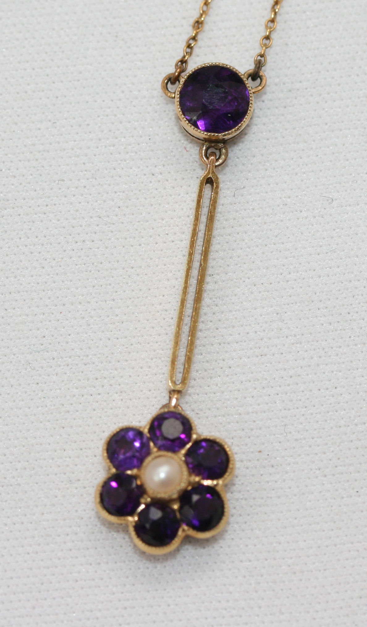 An Edwardian amethyst and seed pearl set necklace,