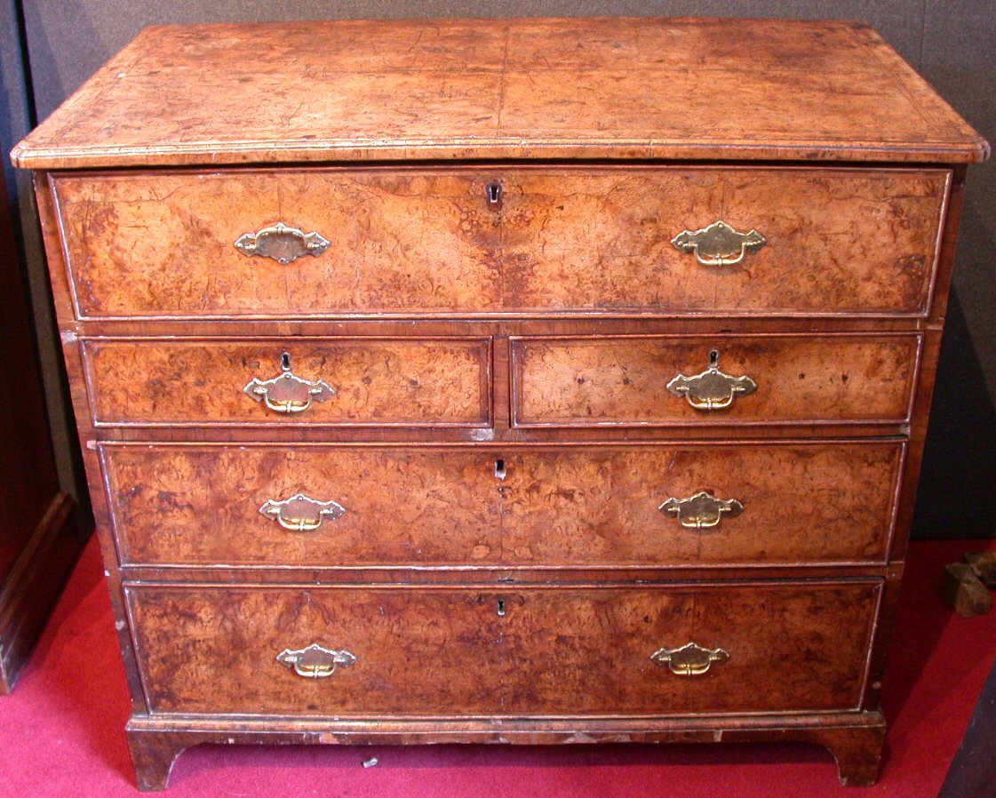 An 18th century walnut and feather banded secretaire chest,
