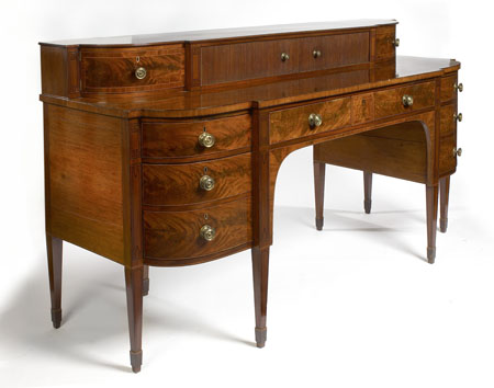 A late George III mahogany and tulipwood crossbanded sideboard