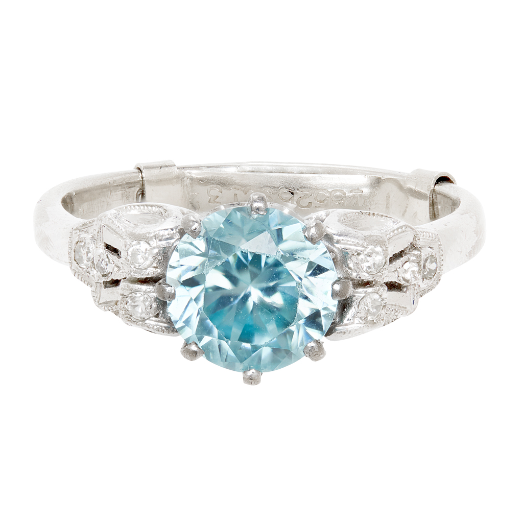 A blue zircon and diamond cluster ring