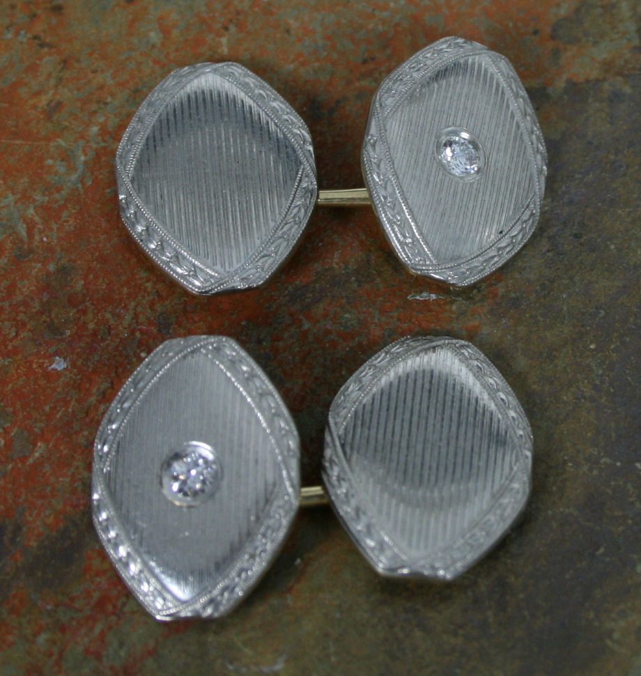 A pair of diamond set cufflinks,