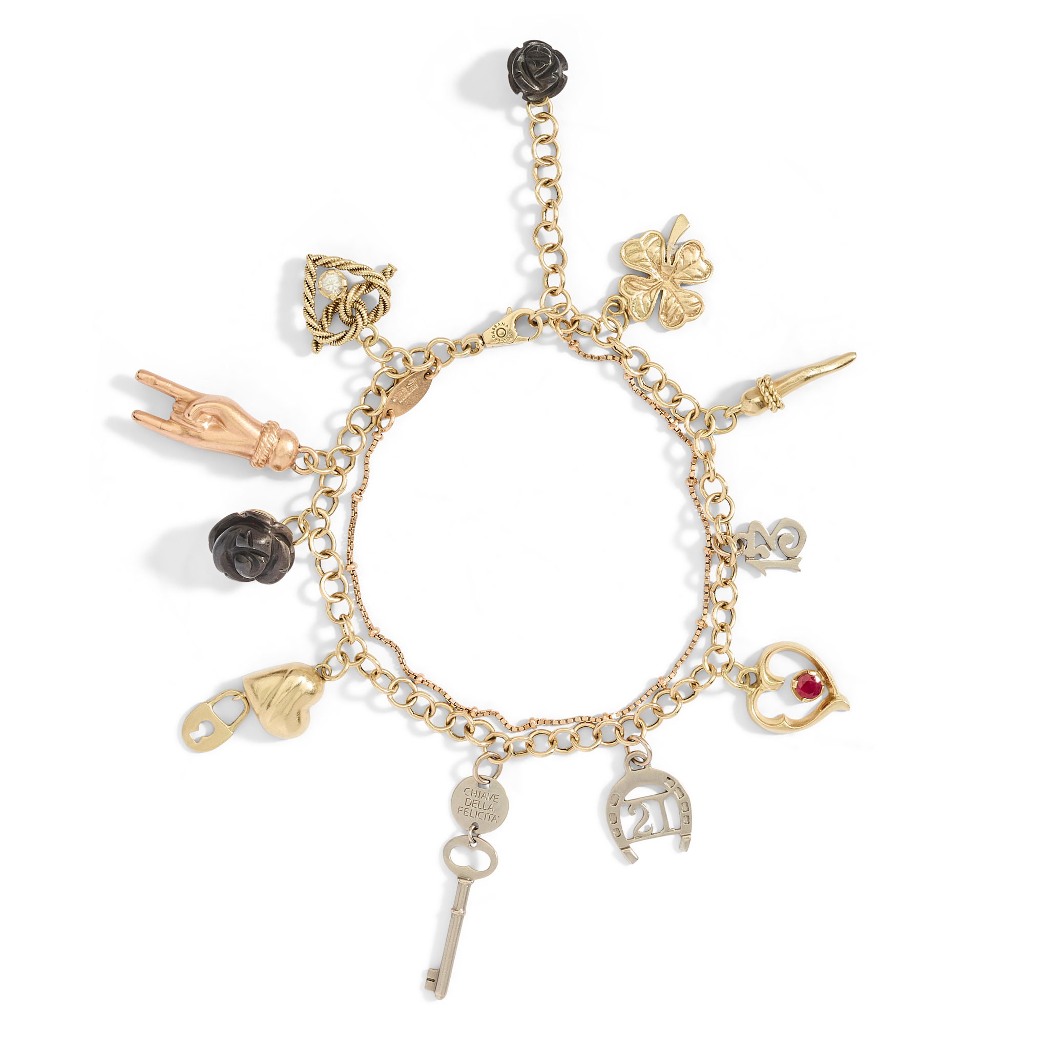 Dolce & Gabbana: An 18ct gold charm bracelet