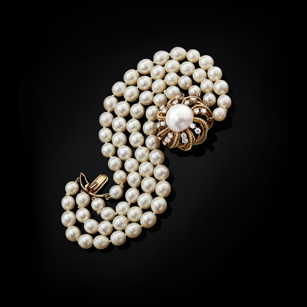 SEAMAN SCHEPPS - A pearl and diamond set bracelet
