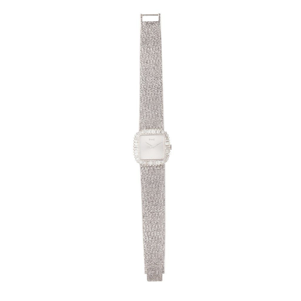 PIAGET - A lady's 18ct white gold and diamond set cocktail watch