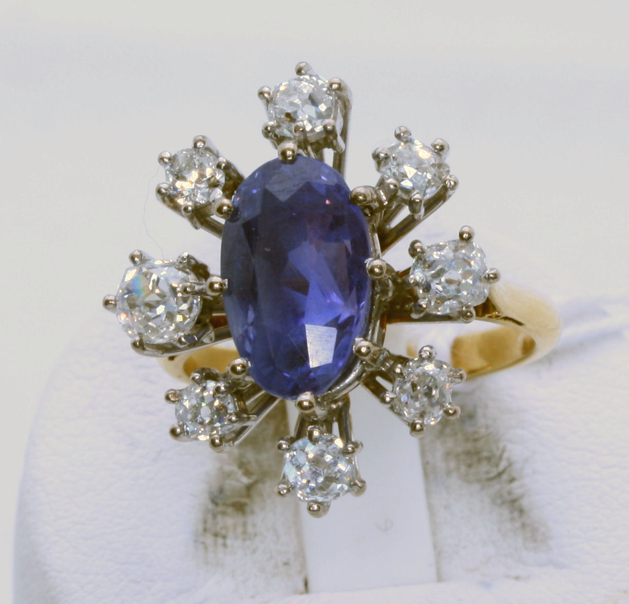 A sapphire and diamond floral cluster ring,