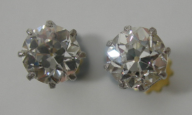 A pair of diamond earrings,