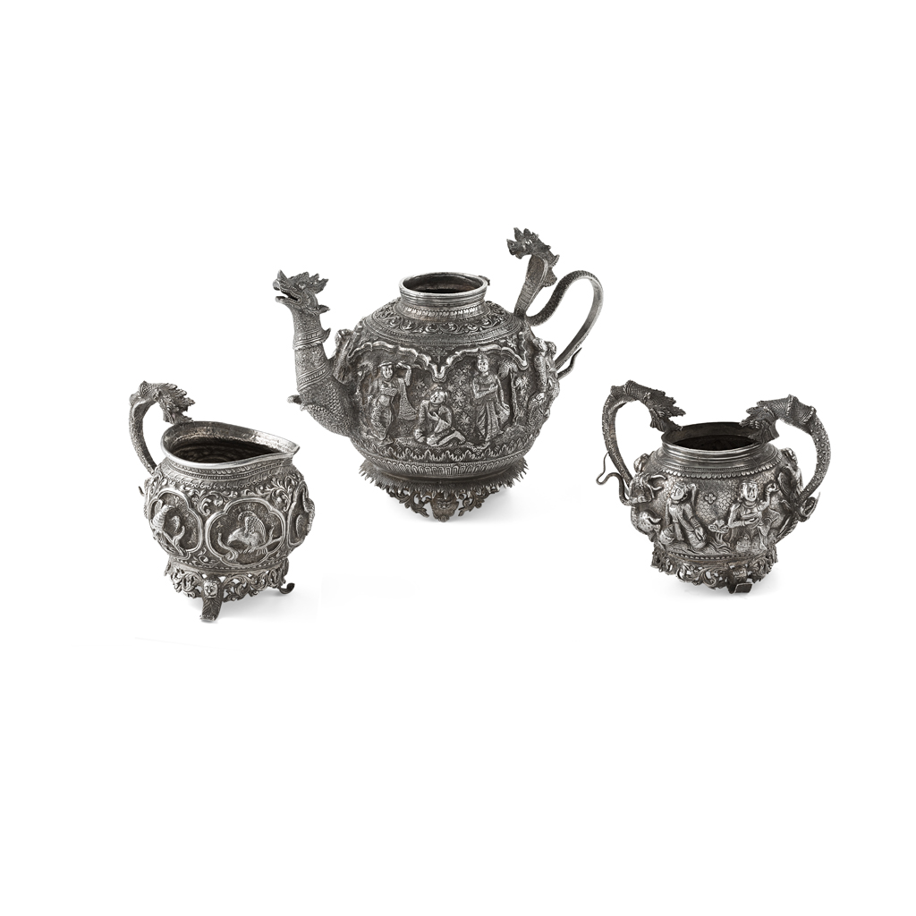 THREE-PIECE WHITE METAL TEA SERVICE