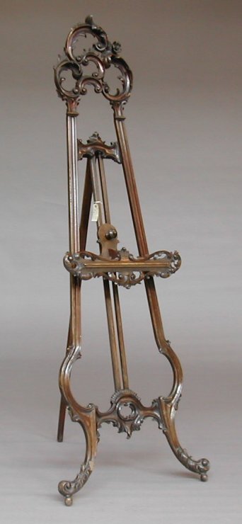 An Edwardian stained beech Rococo style easel