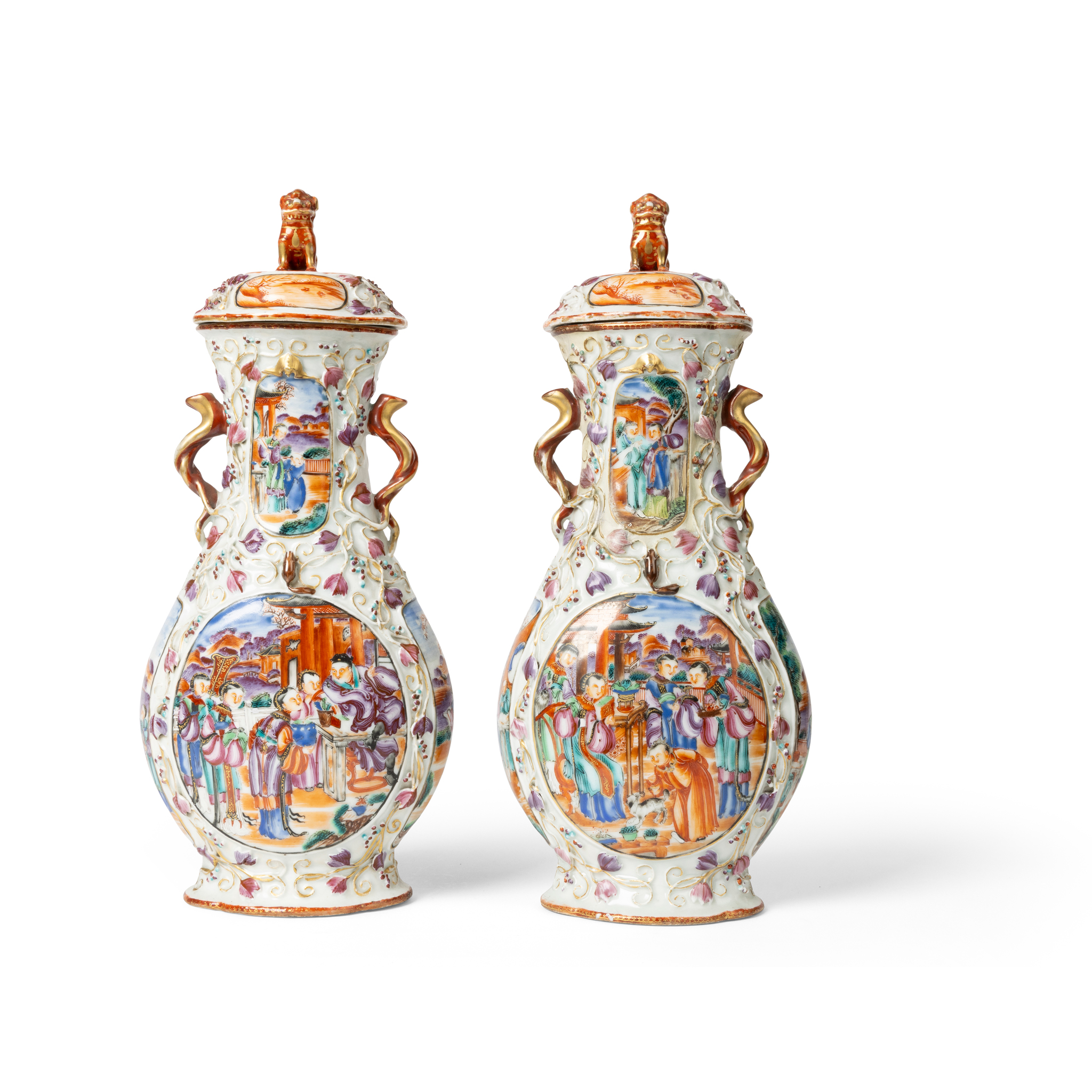 PAIR OF CHINESE MOULDED FAMILLE ROSE VASES WITH COVERS