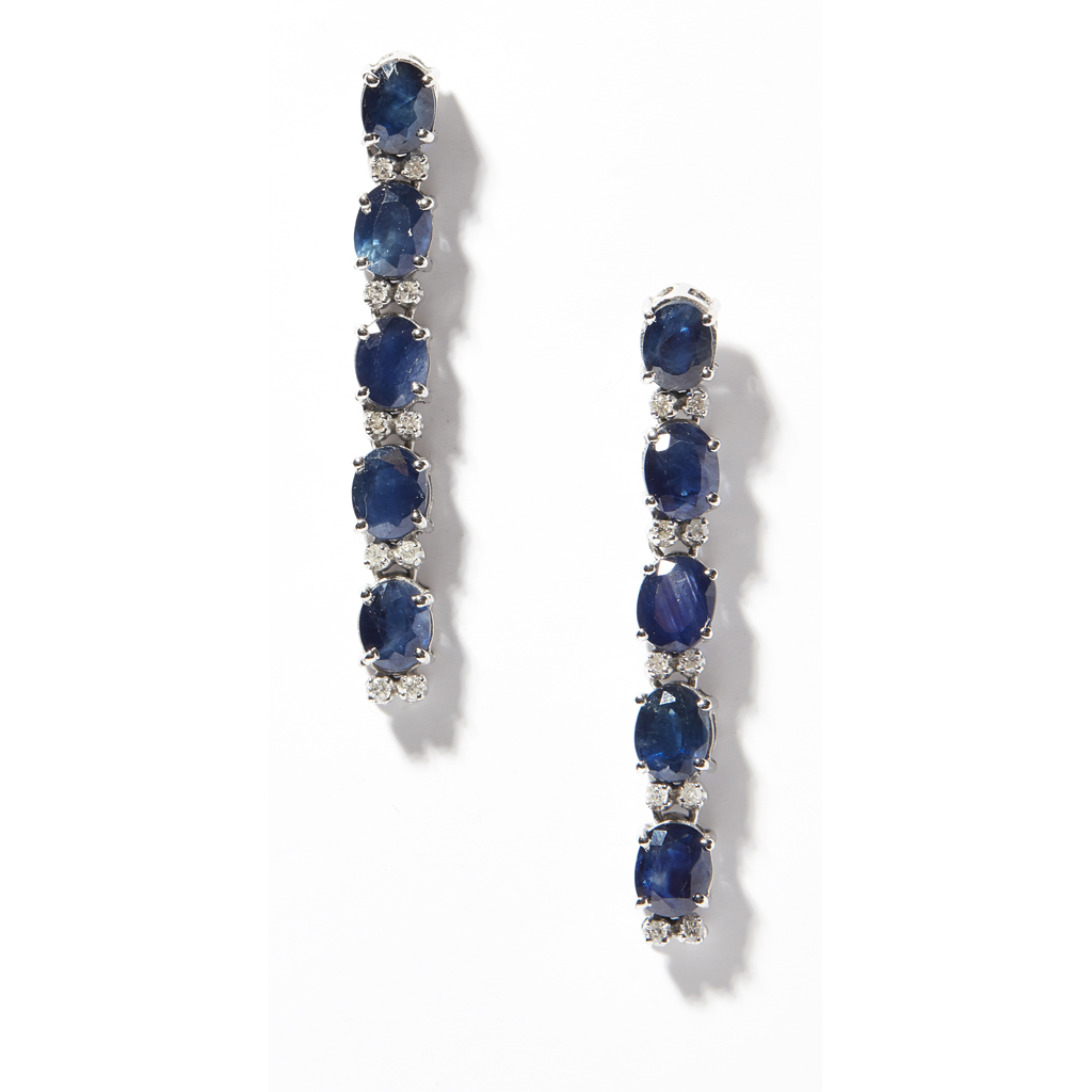A pair of diamond and sapphire set pendant earrings