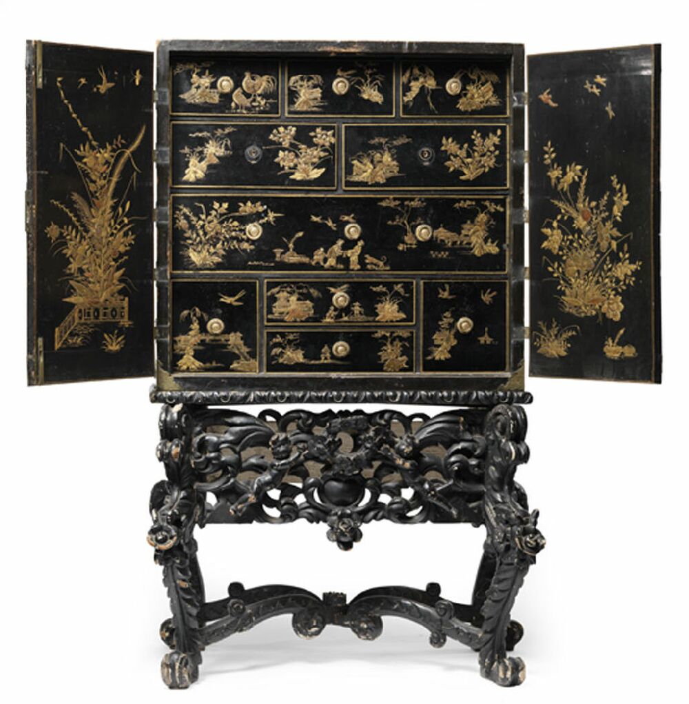 A George III black japanned and Chinoiserie cabinet on stand