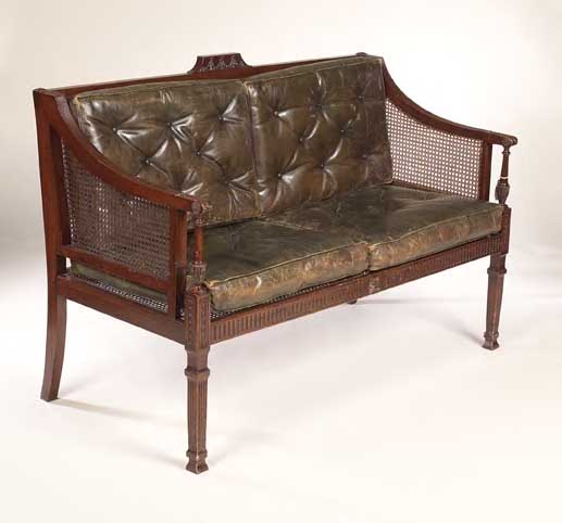 An Edwardian Adam style two seat settee,