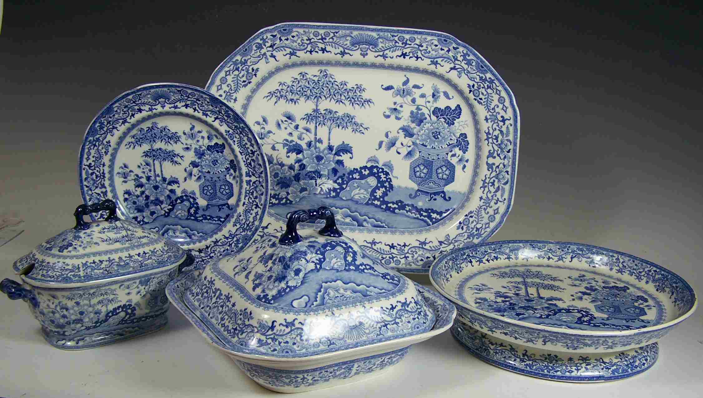 A 19th century blue printed 'Semi China' part dinner service,