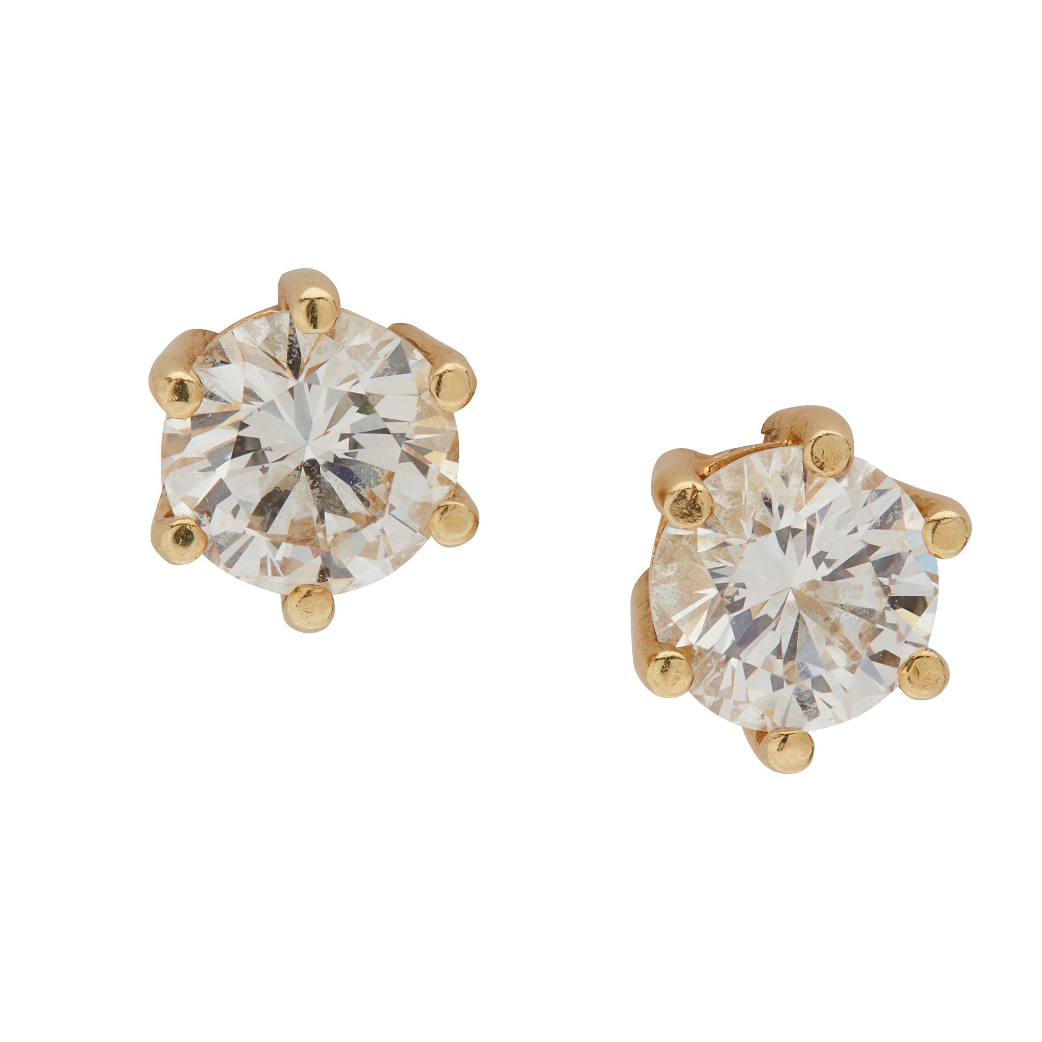 A pair of diamond stud earrings