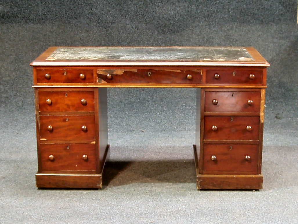 A Victorian mahogany twin pedestal desk