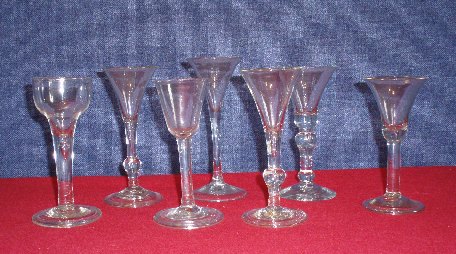 THREE DRAWN TRUMPET BOWL KNOP STEMMED WINE GLASSES