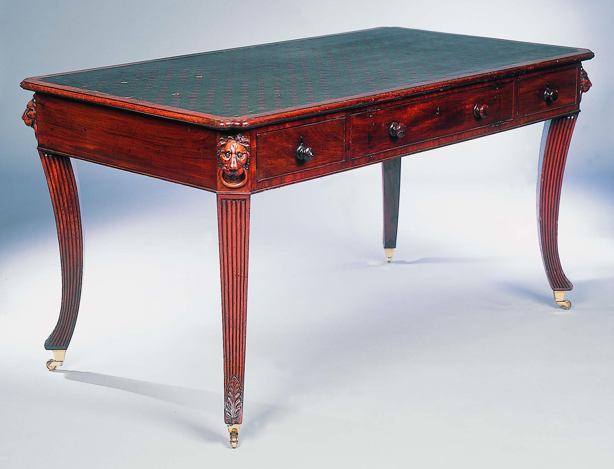 An early 19th century mahogany writing table