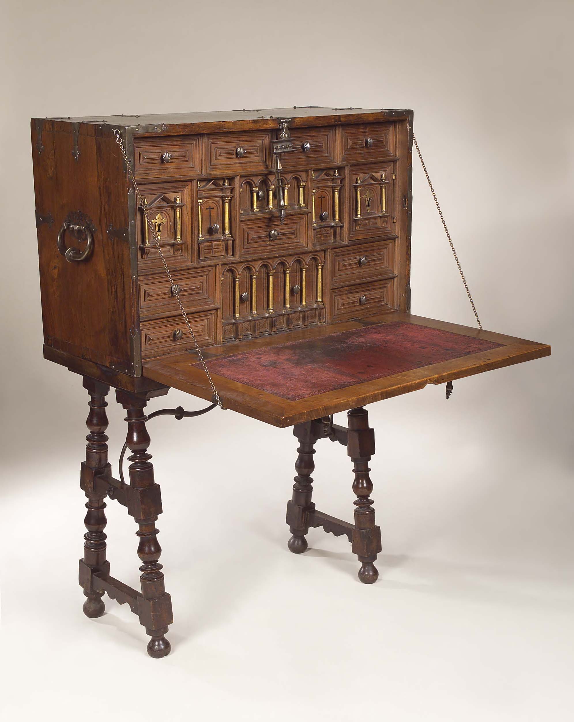A 18th century style Spanish walnut bargueno and table,