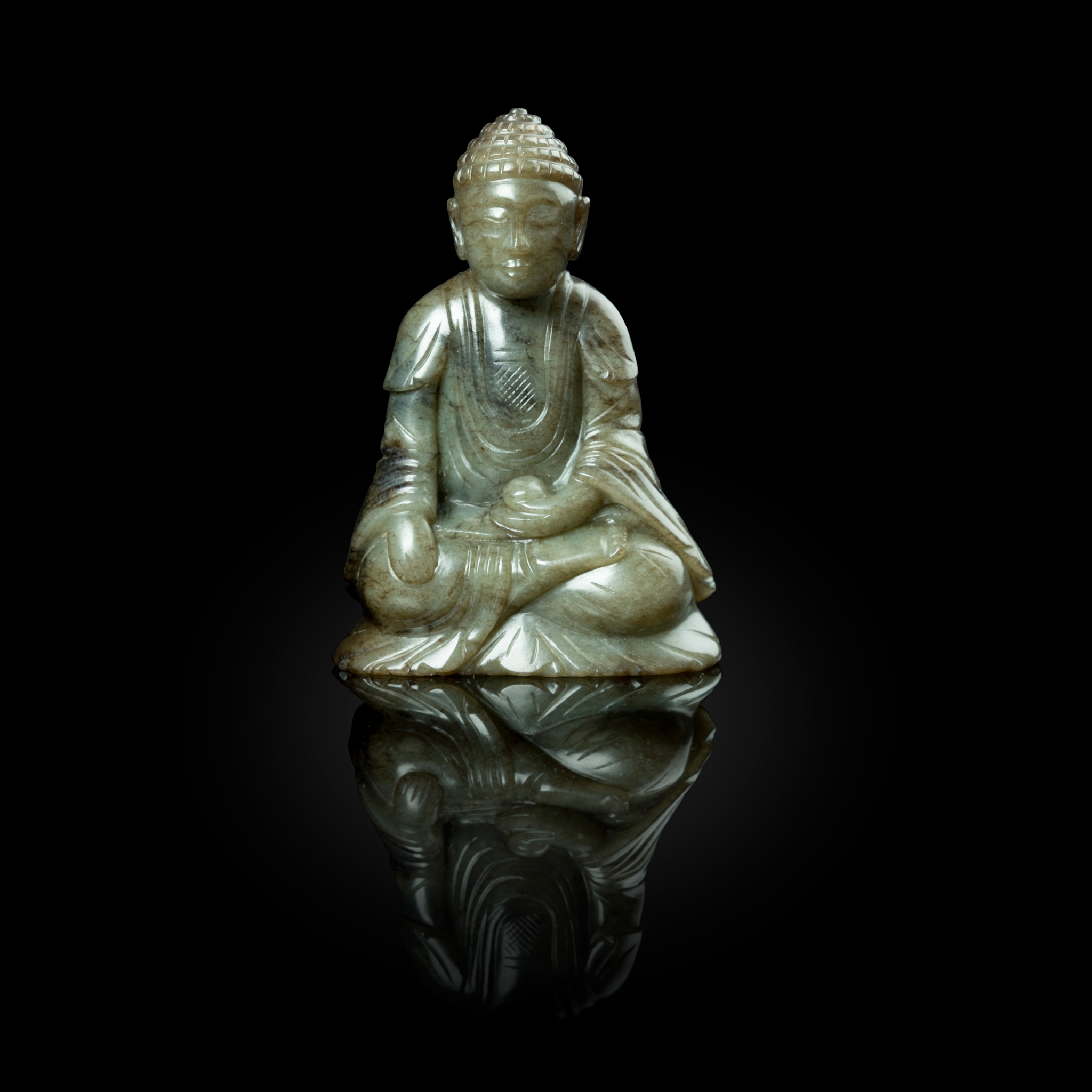 CHINESE WHITE JADE WITH RUSSET INCLUSIONS CARVING OF MEDICINE BUDDHA