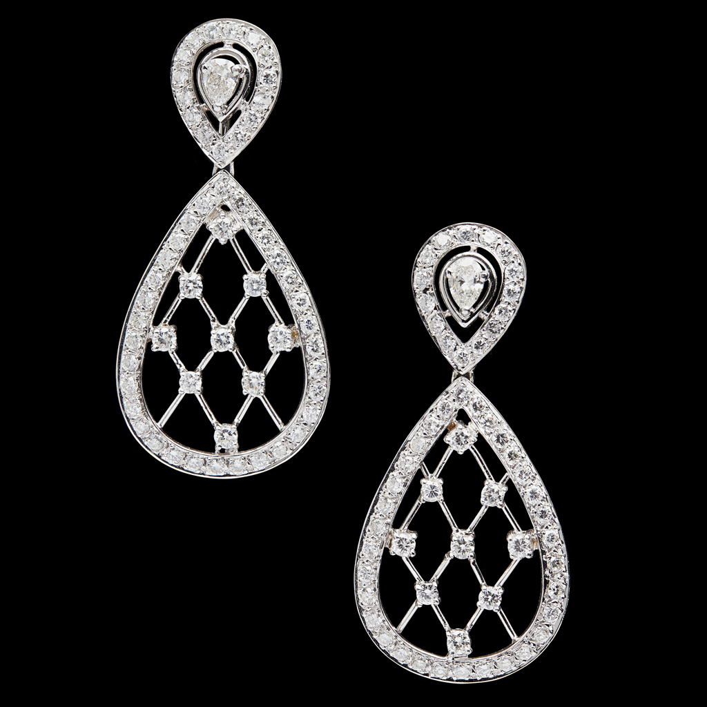 A pair of diamond set pendant earrings