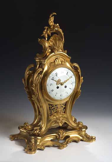 A French gilt bronze mantel clock
