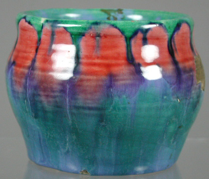 An Allander earthenware candlestick