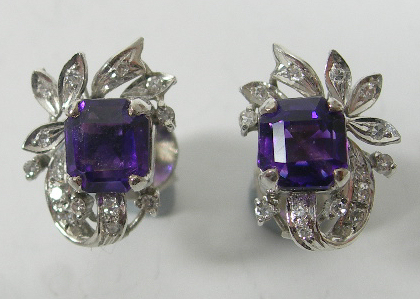 A pair of amethyst and diamond cluster earrings,