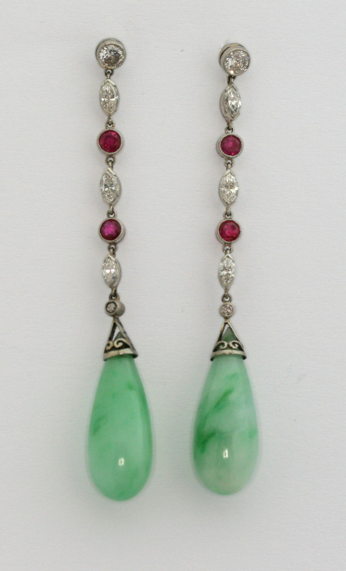 A pair of multi-gem set pendant earrings,