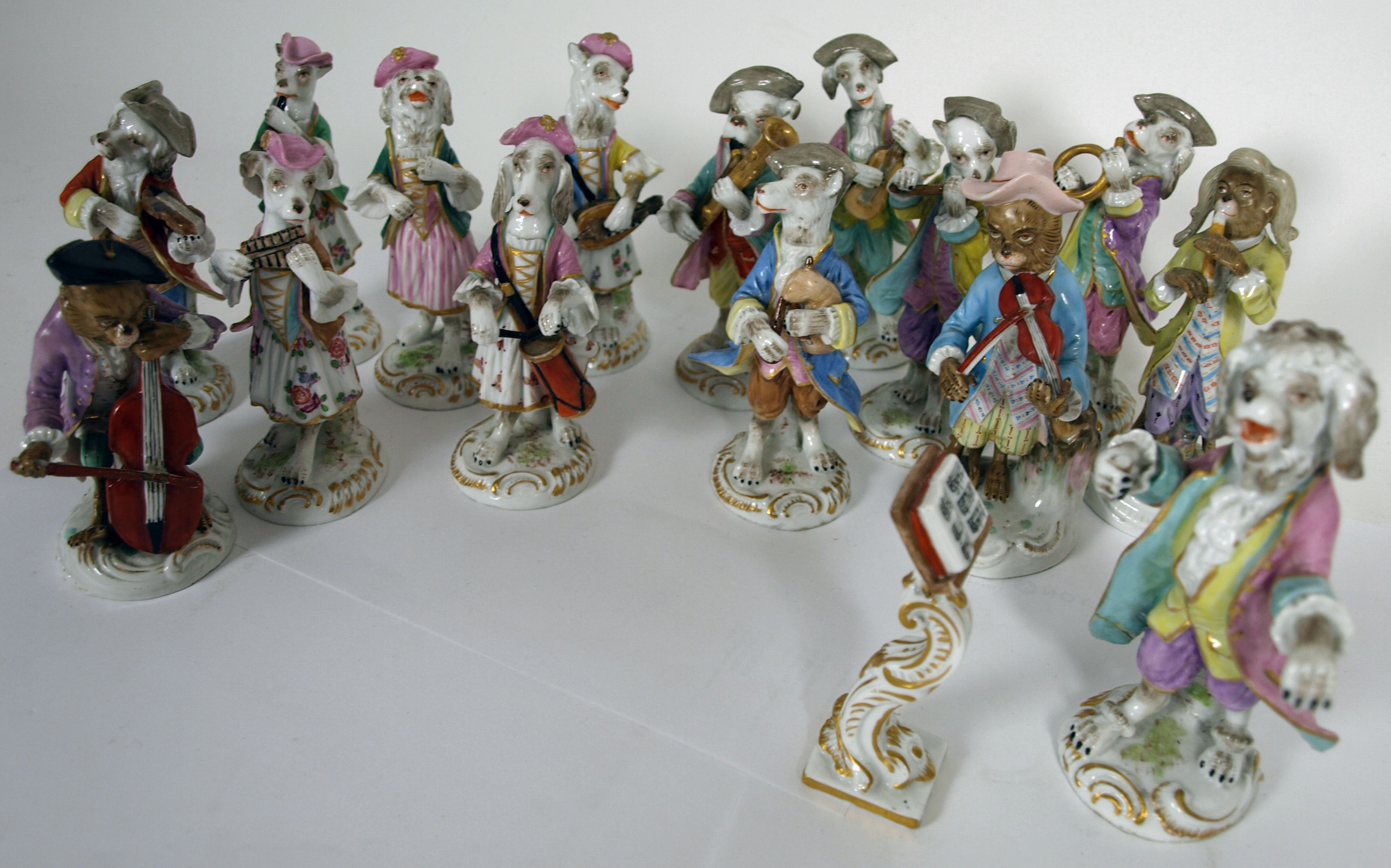 A French porcelain zoomorphic fourteen piece orchestra Bloch, Paris