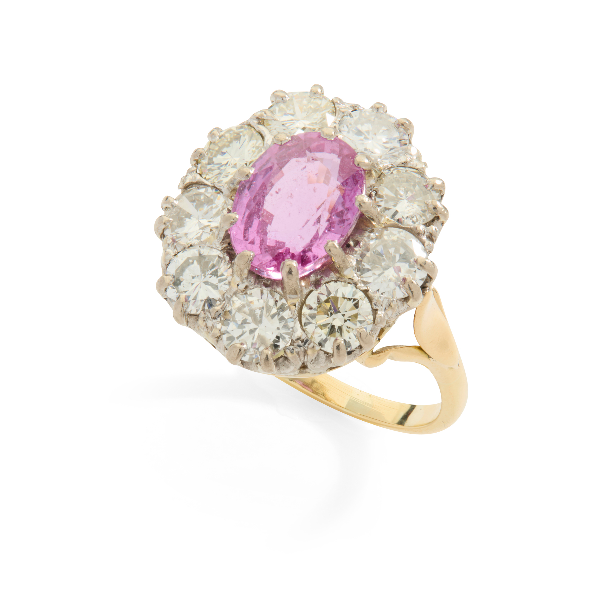 A pink sapphire and diamond cluster ring