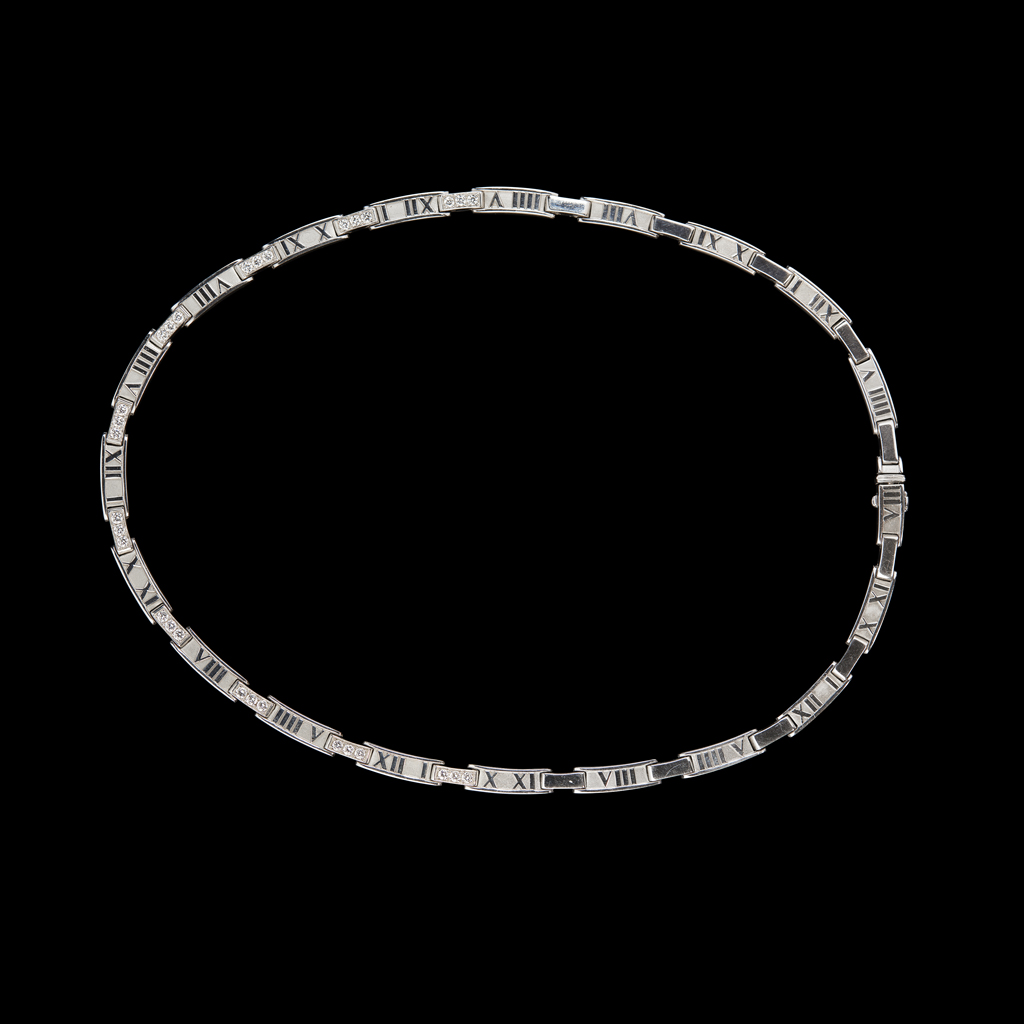 TIFFANY - An 18ct gold diamond set necklace
