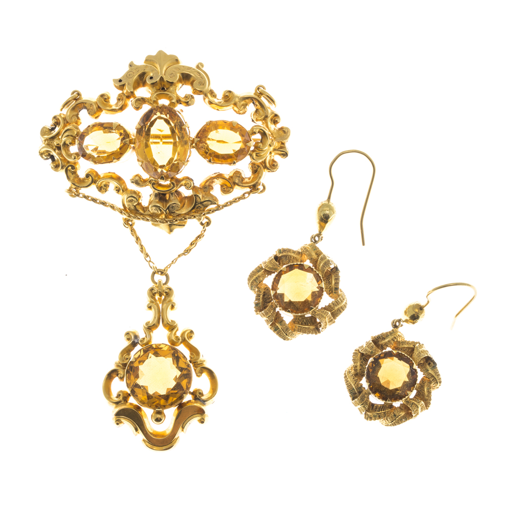 A Victorian citrine mounted brooch and earrings