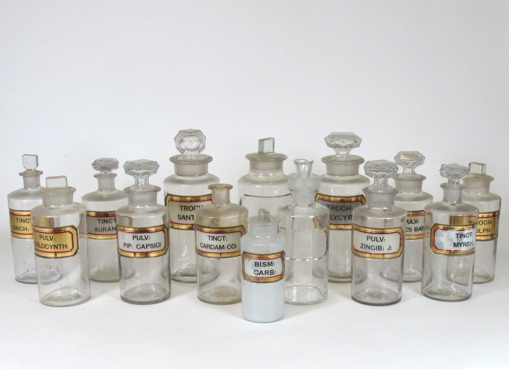 COLLECTION OF GLASS AND CERAMIC PHARMACY BOTTLES