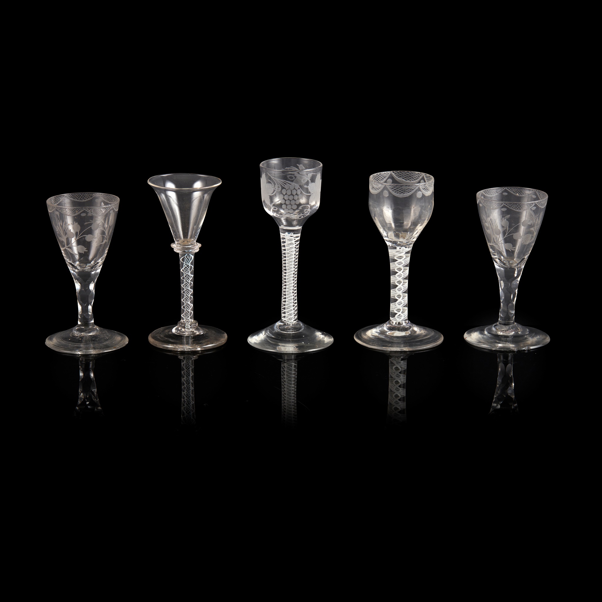 FOUR GEORGIAN WHEEL-ENGRAVED WINE GLASSES