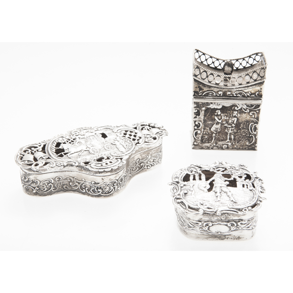A group of three silver boxes