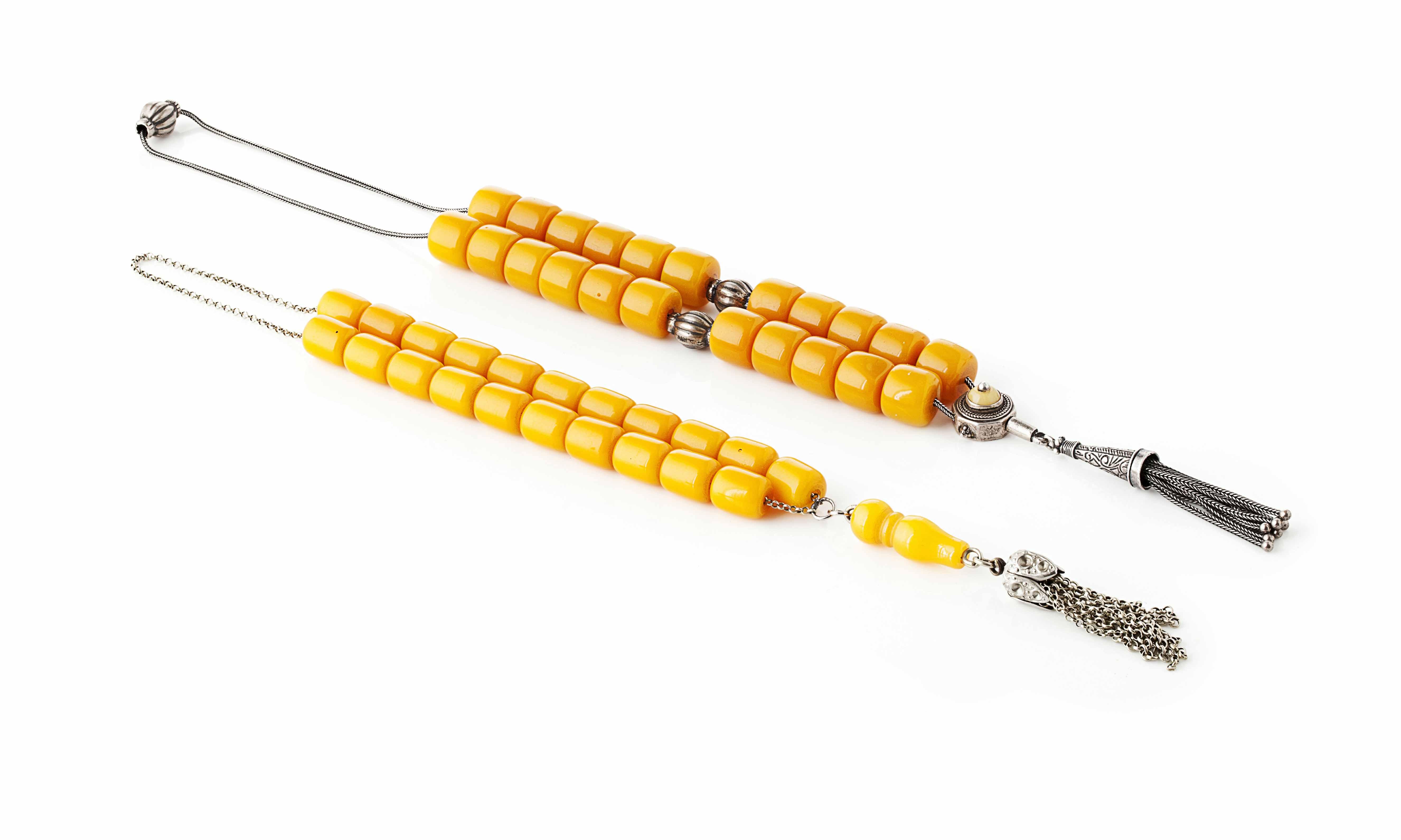 PAIR OF AMBER ROSARIES