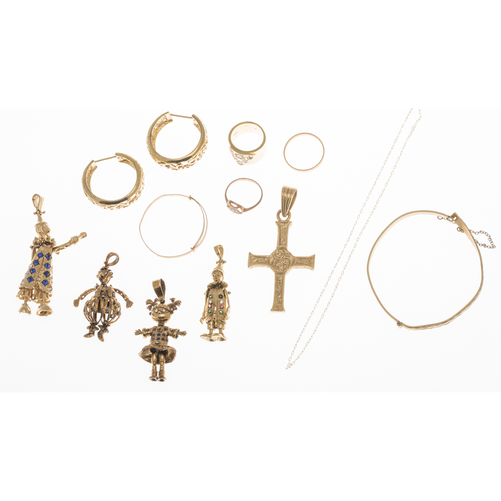 A collection of 9ct gold and gem set clown pendants