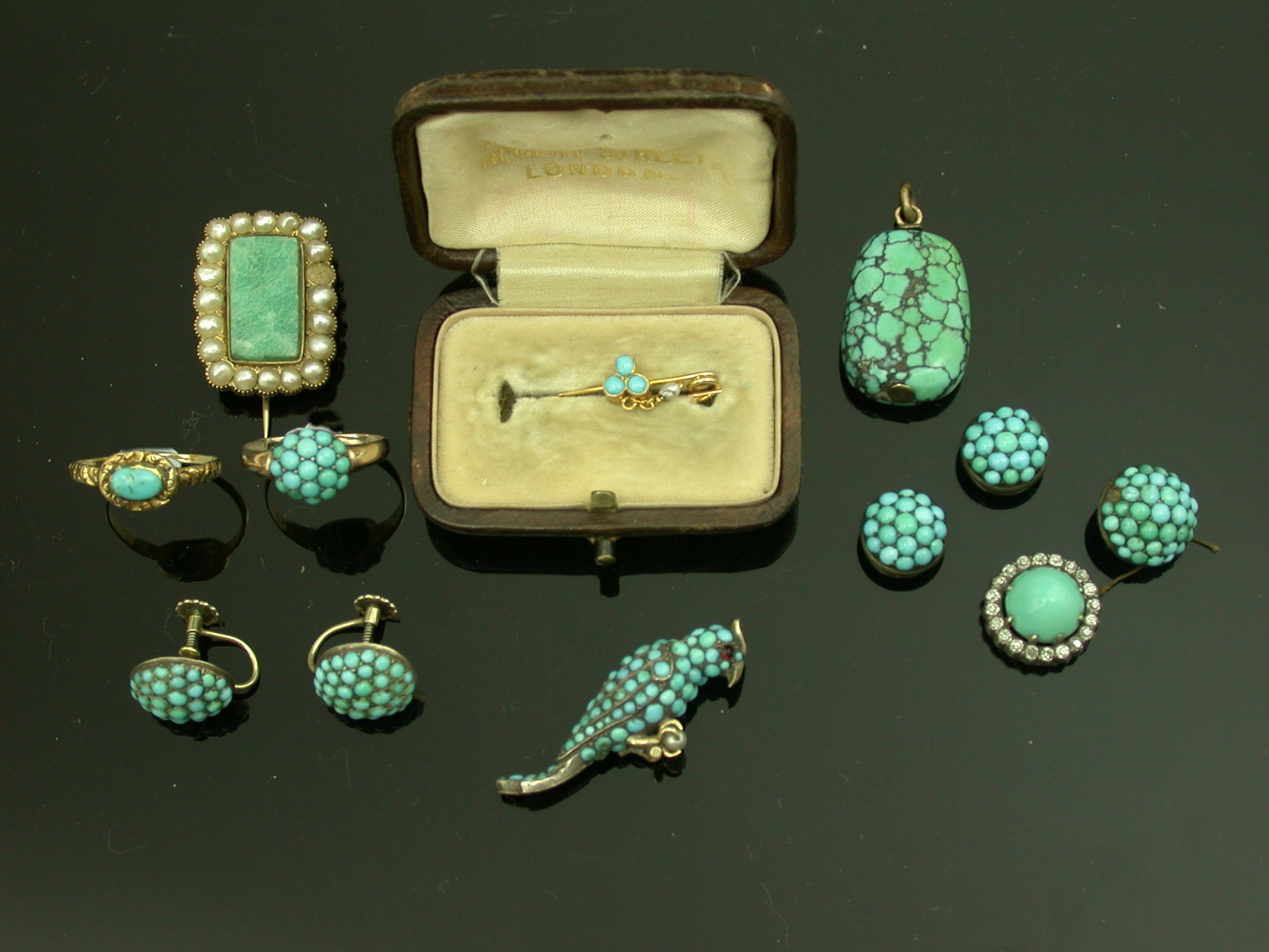 A collection of mostly turquoise set jewellery,