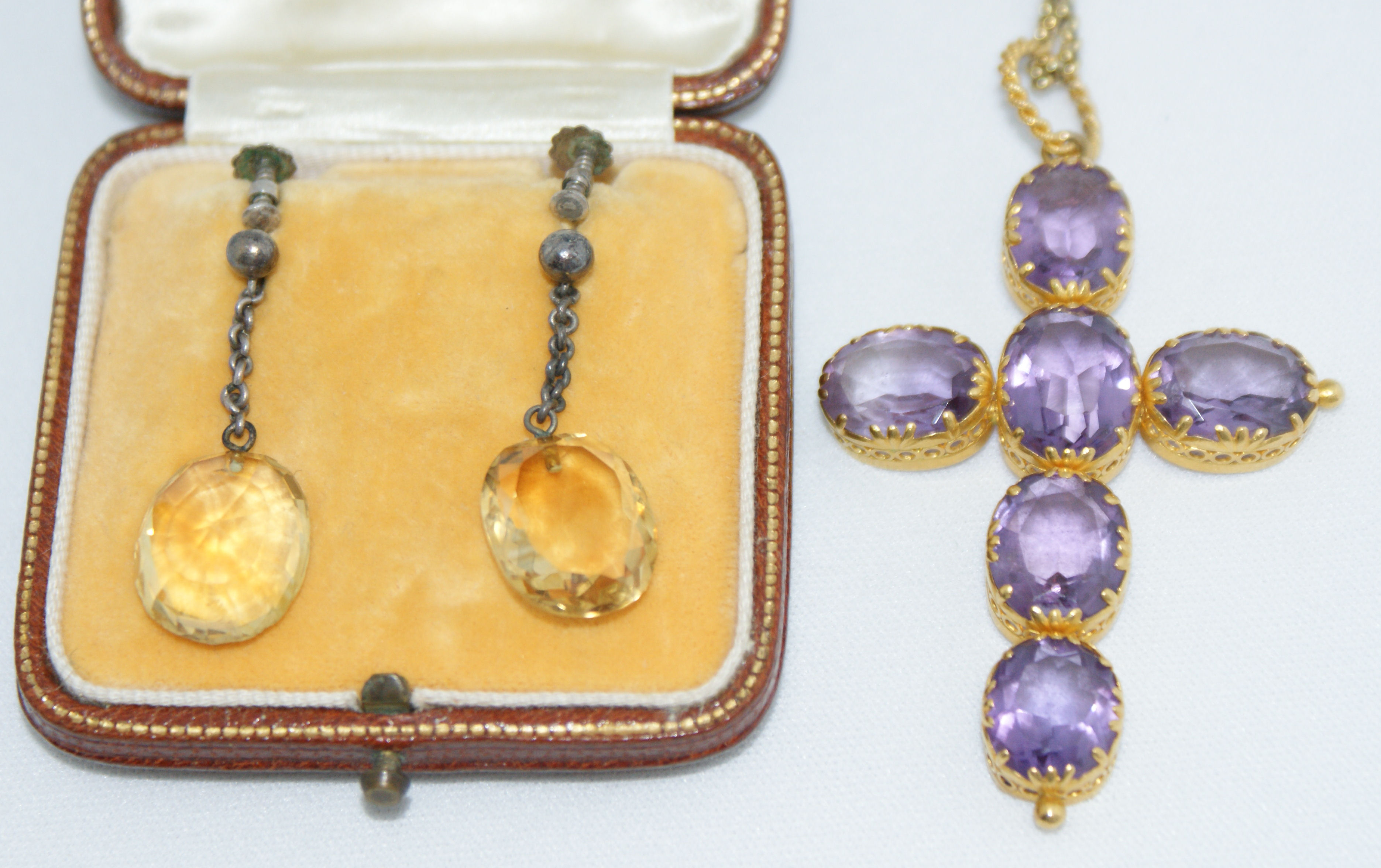 An Edwardian amethyst set cross form pendant,