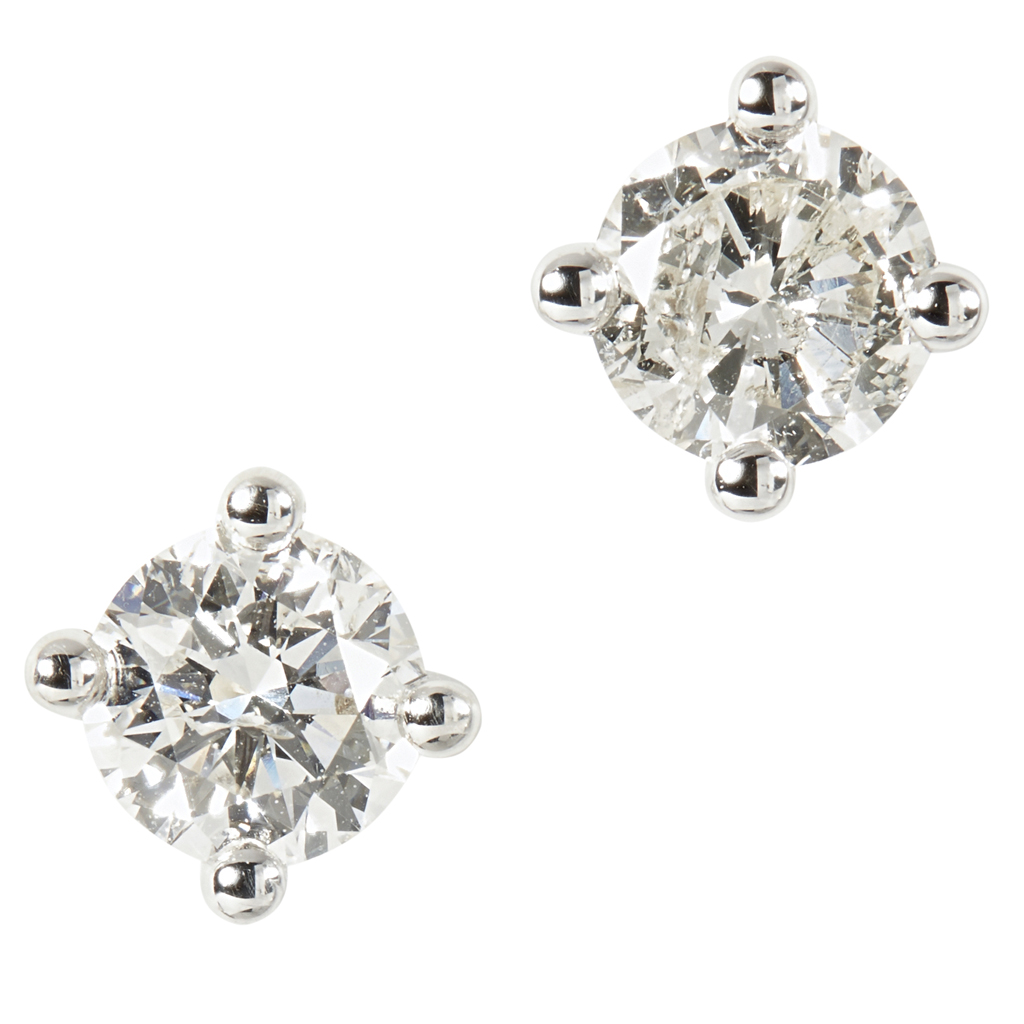 A pair of diamond set stud earrings
