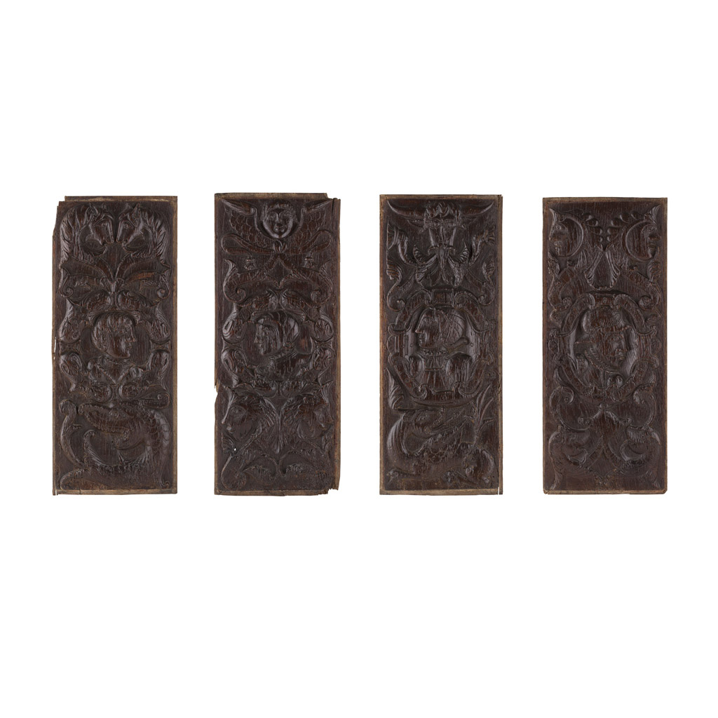 FOUR ENGLISH CARVED OAK 'ROMAYNE' PANELS
